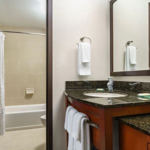 Guest bathroom with shower and tub at Hyatt PLACE Fort Lauderdale Airport - South & Cruise Port.