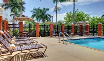 Sun loungers beside the pool at Hyatt PLACE Fort Lauderdale Airport - South & Cruise Port.