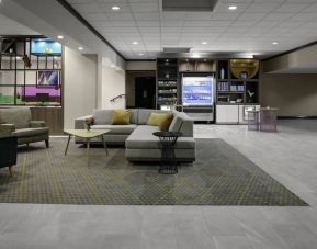 Lobby and coworking space at Holiday Inn Hotel & Suites Boston - Peabody.