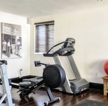 Equipped fitness center at Hotel Croydon.