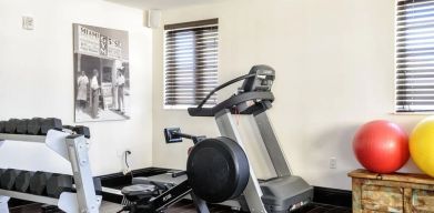 Equipped fitness center at Hotel Croydon.