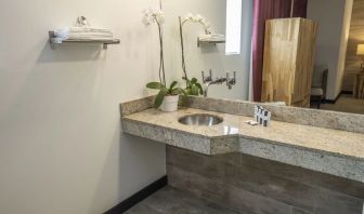 Guest bathroom with shower at Catalina Hotel & Beach Club.