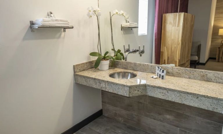 Guest bathroom with shower at Catalina Hotel & Beach Club.