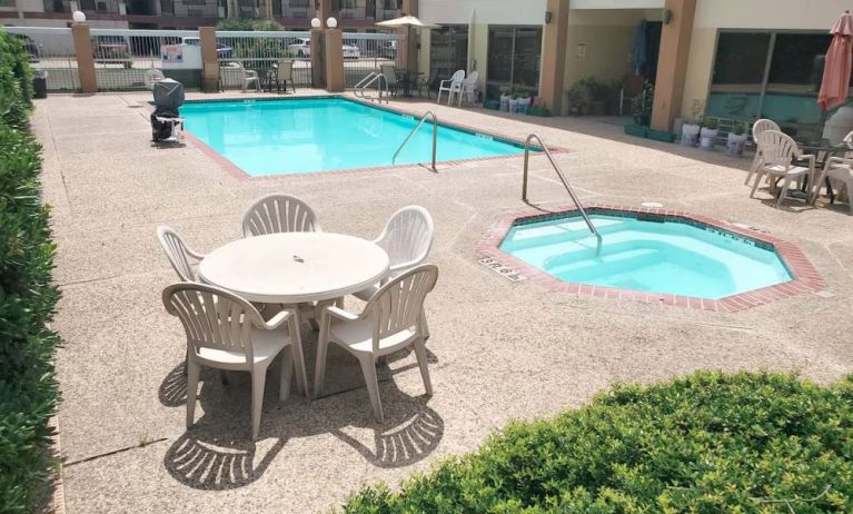 Refreshing outdoor pool at Coratel Inn & Suites By Jasper New Braunfels IH-35 EXT 189.