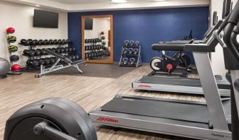 The Hampton Inn Chicago O`Hare’s fitness center includes a range of exercise machines and weights.