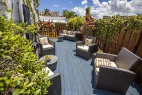 Comfortable outdoor meeting space at Hollywood Beach Suites, A South Beach Group Hotel.