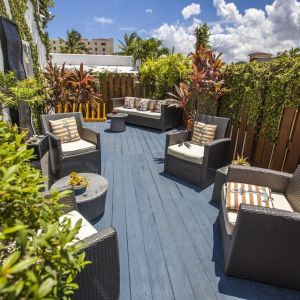 Comfortable outdoor meeting space at Hollywood Beach Suites, A South Beach Group Hotel.