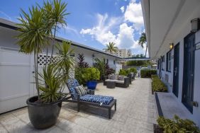 Relaxing outdoor terrace at Hollywood Beach Suites, A South Beach Group Hotel.