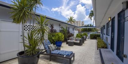 Relaxing outdoor terrace at Hollywood Beach Suites, A South Beach Group Hotel.