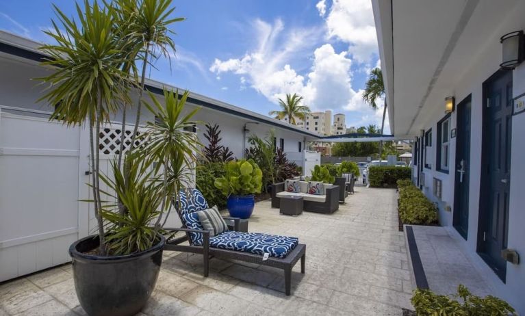 Relaxing outdoor terrace at Hollywood Beach Suites, A South Beach Group Hotel.