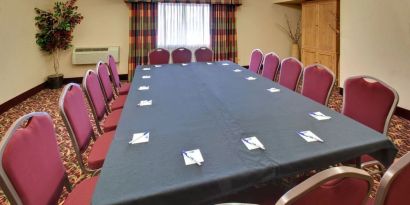 Professional meeting room at Holiday Inn Express Chicago - Downers Grove.