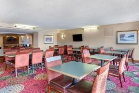 Dining and coworking space at Holiday Inn Express Chicago - Downers Grove.