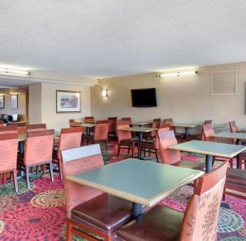 Dining and coworking space at Holiday Inn Express Chicago - Downers Grove.