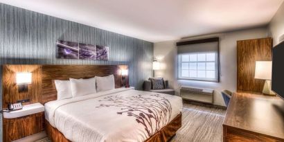 Delux king room with natural light at Sleep Inn Oakbrook Terrace.