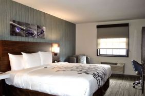 King bed with work space at Sleep Inn Oakbrook Terrace.