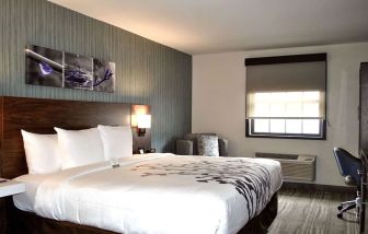 King bed with work space at Sleep Inn Oakbrook Terrace.