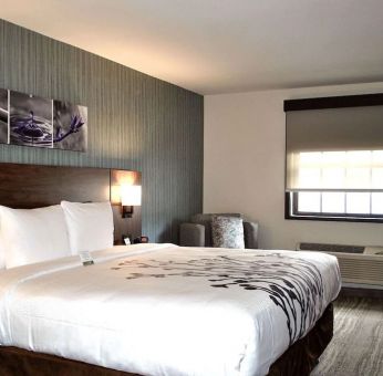 King bed with work space at Sleep Inn Oakbrook Terrace.