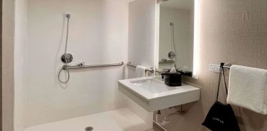 Guest bathroom with shower at Sleep Inn Oakbrook Terrace.