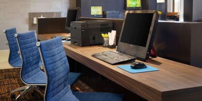 Business center with PC, printer, and internet at Sonesta Select Scottsdale At Mayo Clinic Campus.