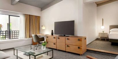 Day use room with TV and lounge area at Hilton Scottsdale Resort & Villas.