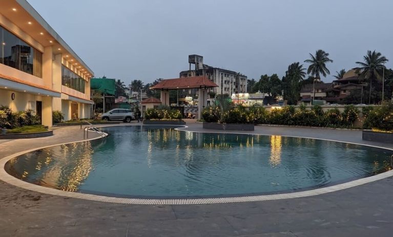 Relaxing outdoor pool at Mayur Belgaum Presidency Hotel & Spa.