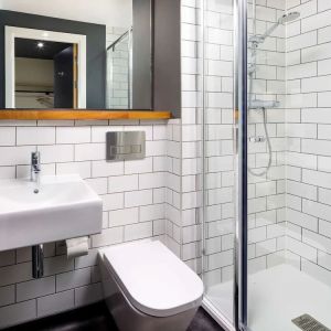 Guest bathroom with shower at Ibis Budget Sheffield Centre St Marys Gate.