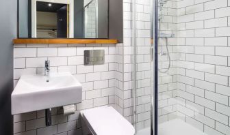 Guest bathroom with shower at Ibis Budget Sheffield Centre St Marys Gate.