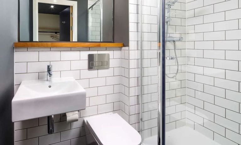 Guest bathroom with shower at Ibis Budget Sheffield Centre St Marys Gate.