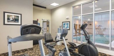 Fitness center with treadmills at Holiday Inn Aurora North- Naperville.