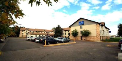 Parking area available at Norwood Inn & Suites - Roseville.