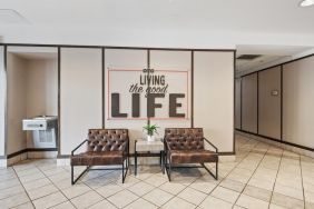 Lobby and coworking space at OYO Townhouse Orlando West.