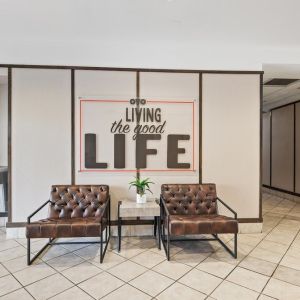 Lobby and coworking space at OYO Townhouse Orlando West.