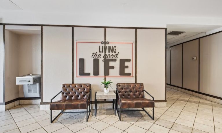 Lobby and coworking space at OYO Townhouse Orlando West.