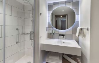 Private bathroom with shower at Hampton By Hilton Dublin City Centre.