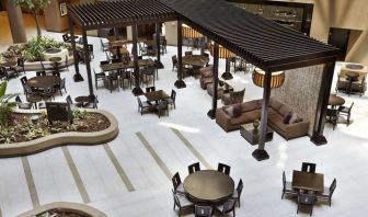 Dining area perfect for coworking at Embassy Suites By Hilton, Crystal City National Airport.