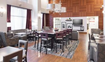 Dining area perfect for coworking at Hampton Inn Los Angeles-Orange County-Cypress.