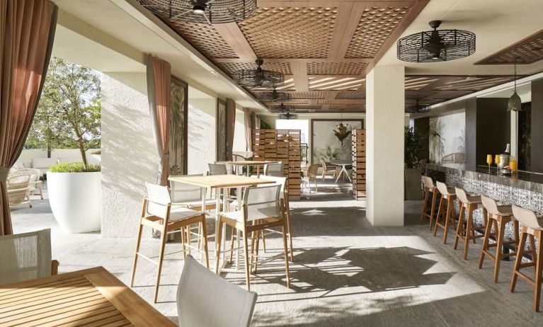 Comfortable lounge and coworking space at THesis Hotel Miami.