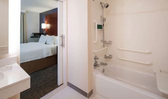 Sonesta ES Suites Nashville Brentwood ensuite bathroom, complete with bath and shower.