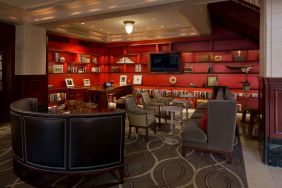 The hotel’s lobby lounge has extensive reading material, comfy chair and sofa seating, and numerous coffee tables.