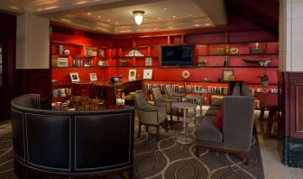 The hotel’s lobby lounge has extensive reading material, comfy chair and sofa seating, and numerous coffee tables.