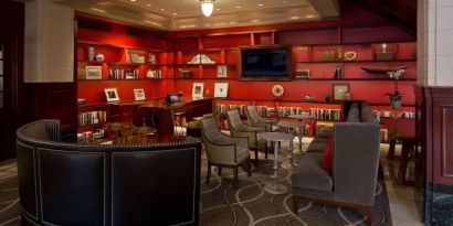 The hotel’s lobby lounge has extensive reading material, comfy chair and sofa seating, and numerous coffee tables.