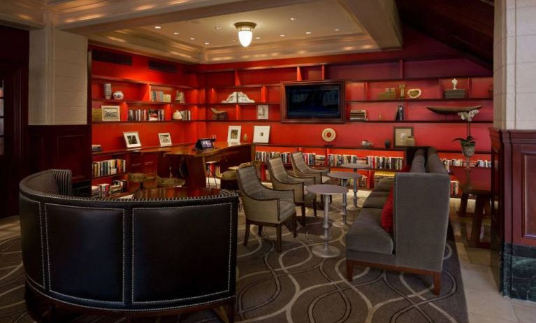 The hotel’s lobby lounge has extensive reading material, comfy chair and sofa seating, and numerous coffee tables.