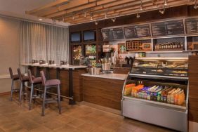 Sonesta Select Arlington Rosslyn breakfast area provides a range of healthy dining options, plus tall stool seating and multiple televisions.