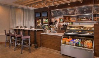 Sonesta Select Arlington Rosslyn breakfast area provides a range of healthy dining options, plus tall stool seating and multiple televisions.