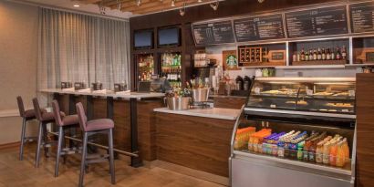 Sonesta Select Arlington Rosslyn breakfast area provides a range of healthy dining options, plus tall stool seating and multiple televisions.