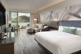 Royal Sonesta Kaua'i Resort Lihue double bed guest room, with sofa, balcony, and an ocean view.