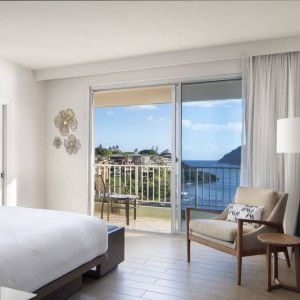 Royal Sonesta Kaua'i Resort Lihue double bed guest room with a balcony and splendid ocean view.