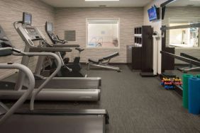 Free weights and various exercise machines are available in the hotel fitness center.