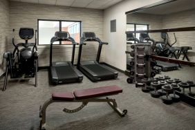 The hotel’s fitness center has treadmills, an elliptical machine, bench, and assorted free weights.