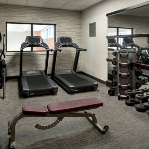 The hotel’s fitness center has treadmills, an elliptical machine, bench, and assorted free weights.